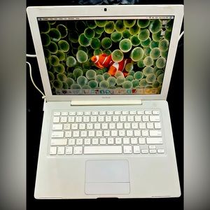apple macbook 13 inch white laptop.